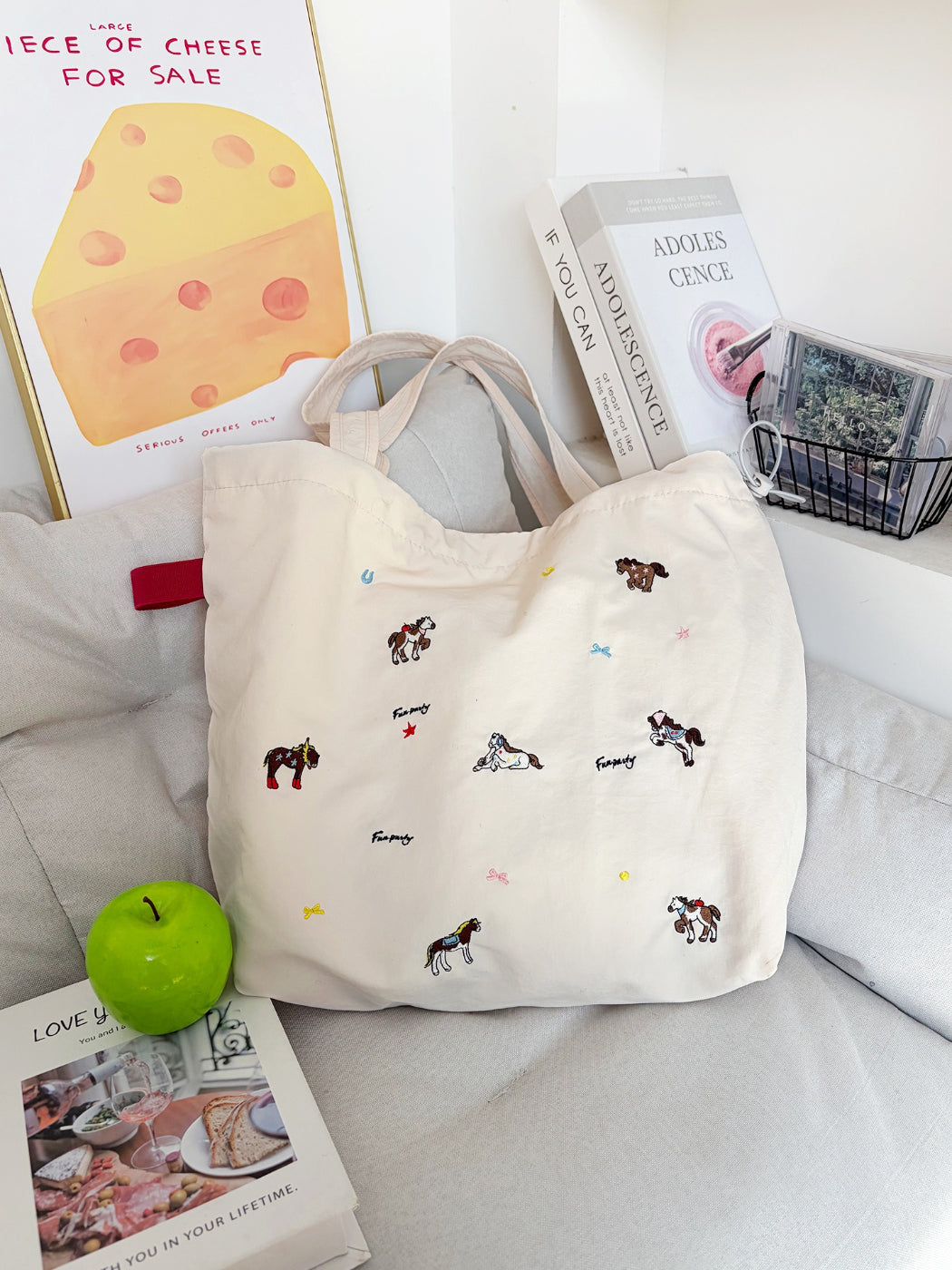 Side view of Cosbai cute horse print drawstring shoulder bag with strap details
