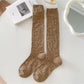 Rufia - Retro Solid Color Knee-High Socks with Embossed Print