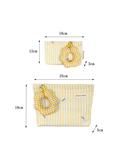 Striped cosmetic bag folded flat showing back side