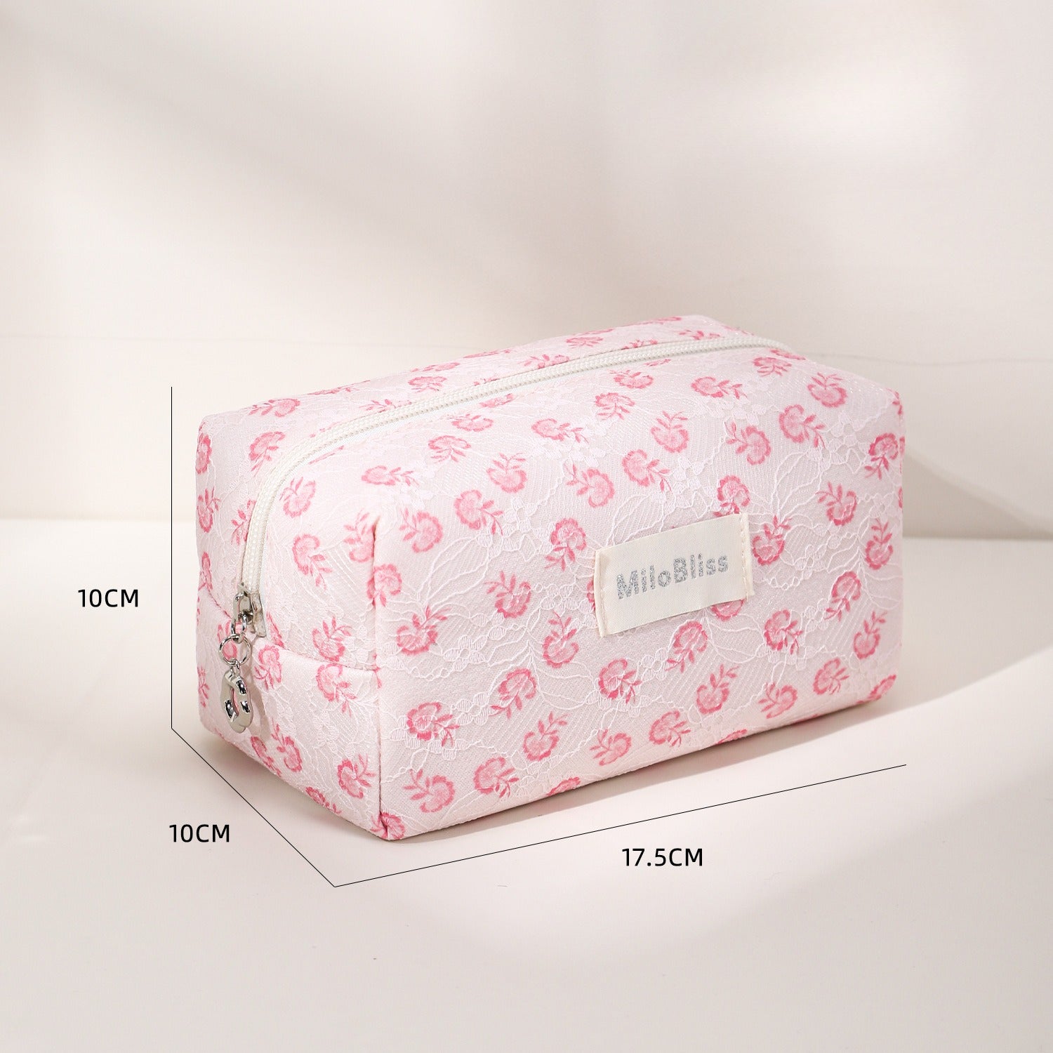Cosbai small floral makeup organizer with a close-up of the floral pattern and zipper