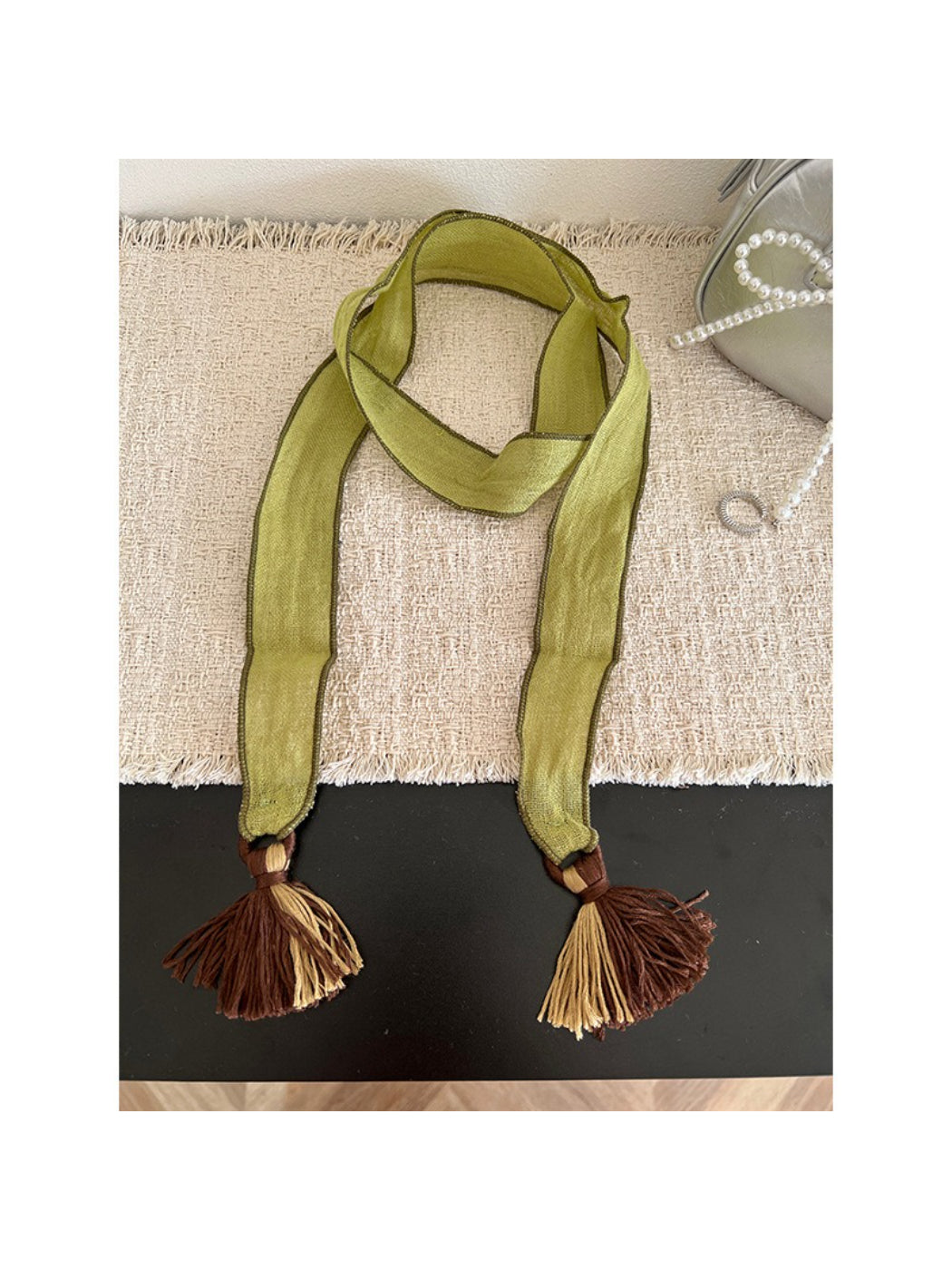 Model wearing Scarvii boho skinny scarf styled around the neck