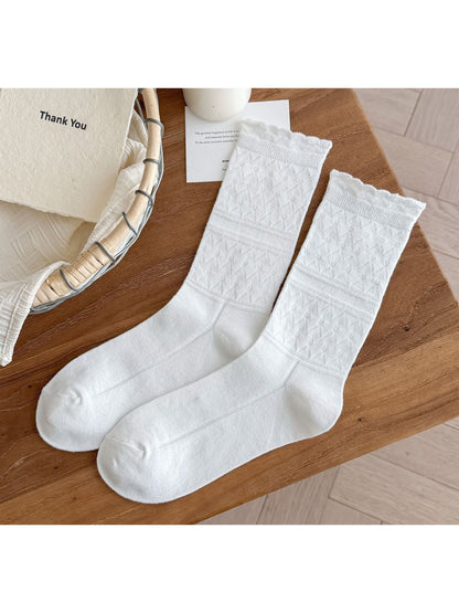 Rufia soft scallop knit socks in light brown color shown from side angle