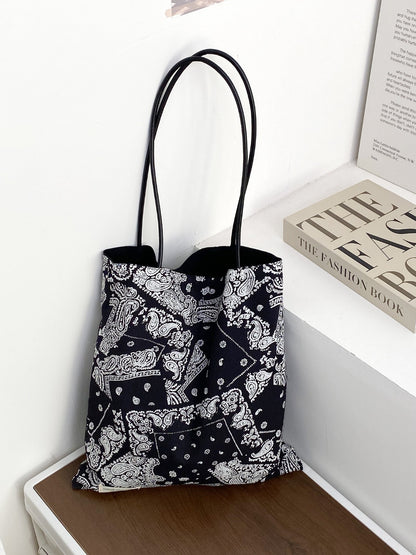 Top view of Cosbai patchwork floral tote bag showing open interior and handles