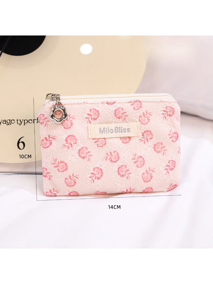 Cosbai floral coin purse lying flat showing full floral pattern and shape