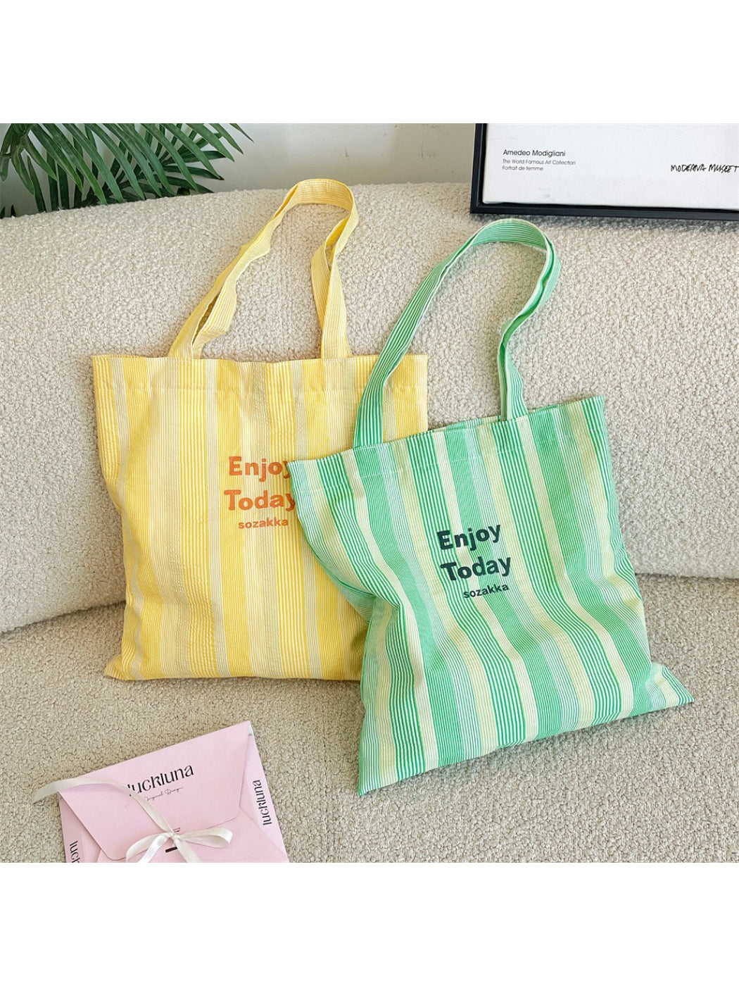 Cosbai casual stripe shopper tote bag with black and white horizontal stripes on a white background