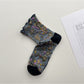 Rufia Heart White Mid-Calf Socks folded neatly with visible heart pattern