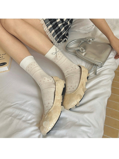 Rufia delicate bow texture socks in multiple pastel shades arranged side by side