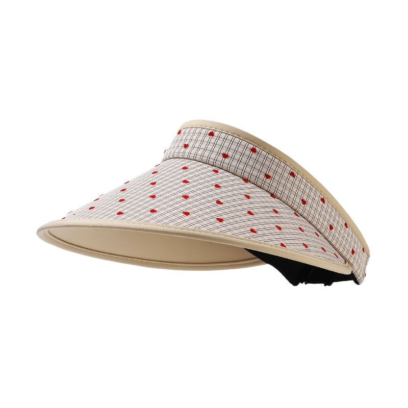 Side view of Haila open crown summer shade hat showing woven texture and wide brim