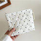 Cosbai Quilted Dot Cosmetic Bag laying flat with visible quilted dot pattern