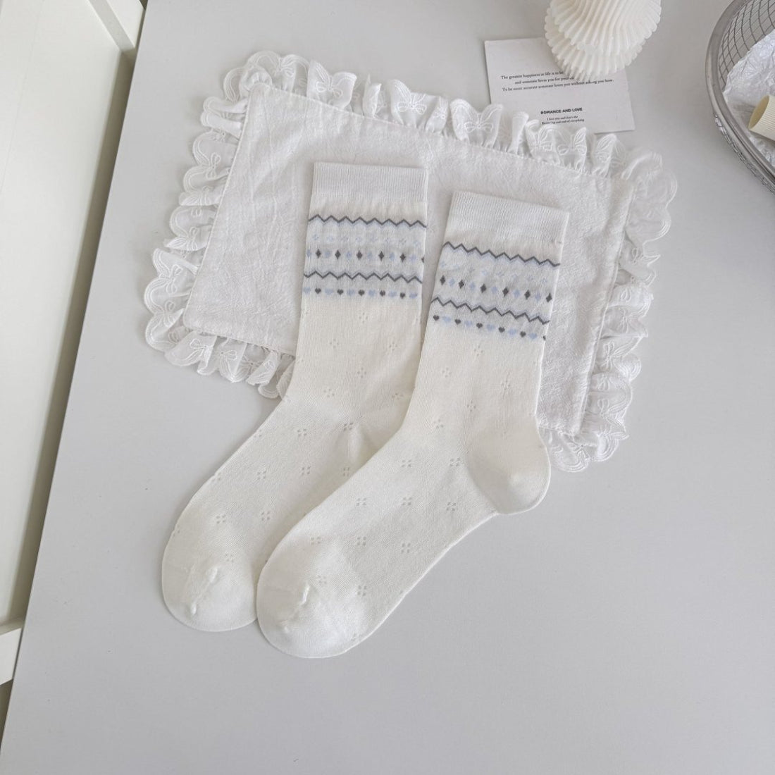 Rufia blue tone crew socks paired with denim jeans