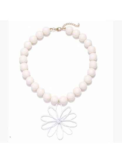 Side view of Neckit Statement Flower Pendant Beaded Necklace highlighting beaded chain