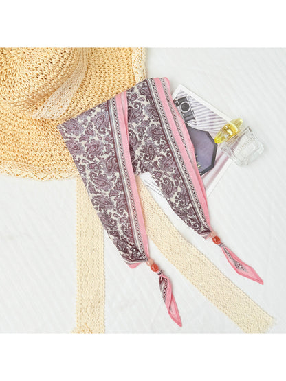 Scarvii Paisley Bead Triangle Scarf draped over shoulder showing fabric texture and design