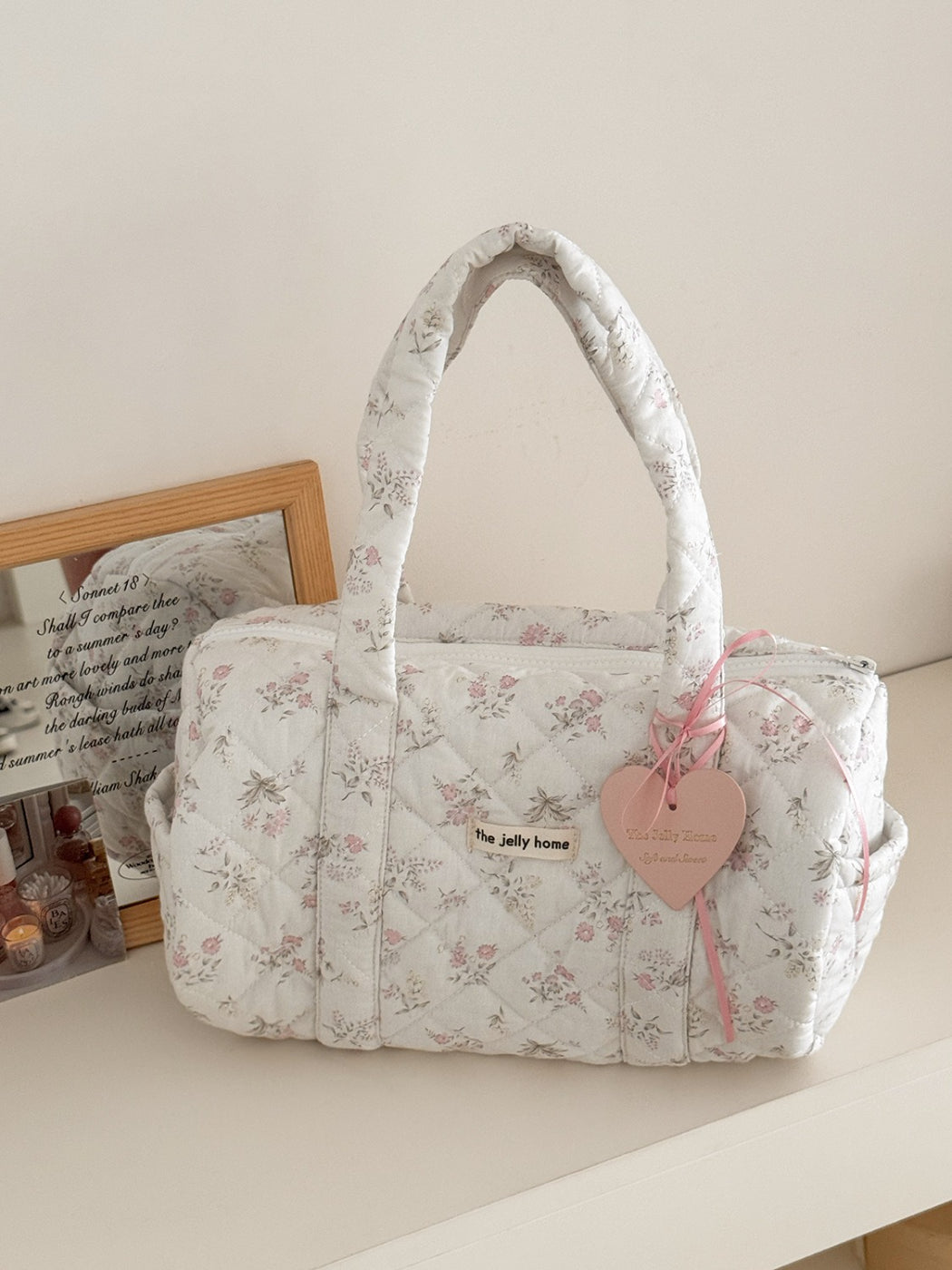 Interior view of Cosbai Quilted Floral Duffle Bag showing spacious compartment