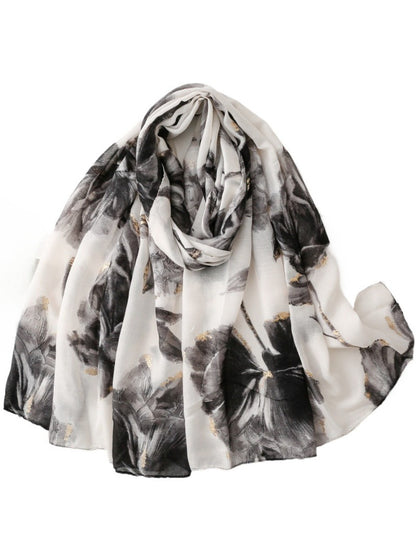Scarvii watercolour floral print scarf folded on white background