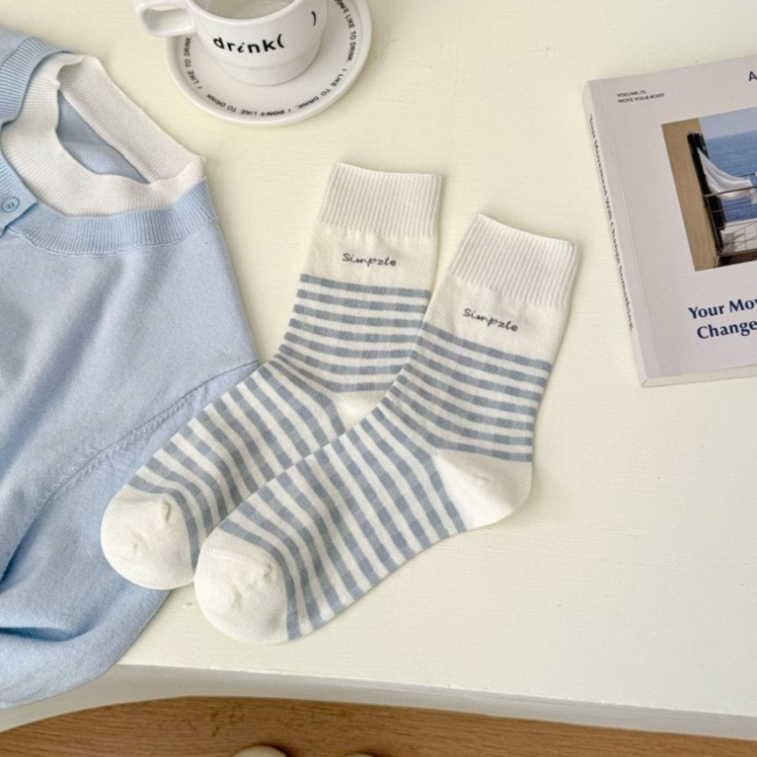 Rufia casual crew socks worn on feet with visible fine stripe design