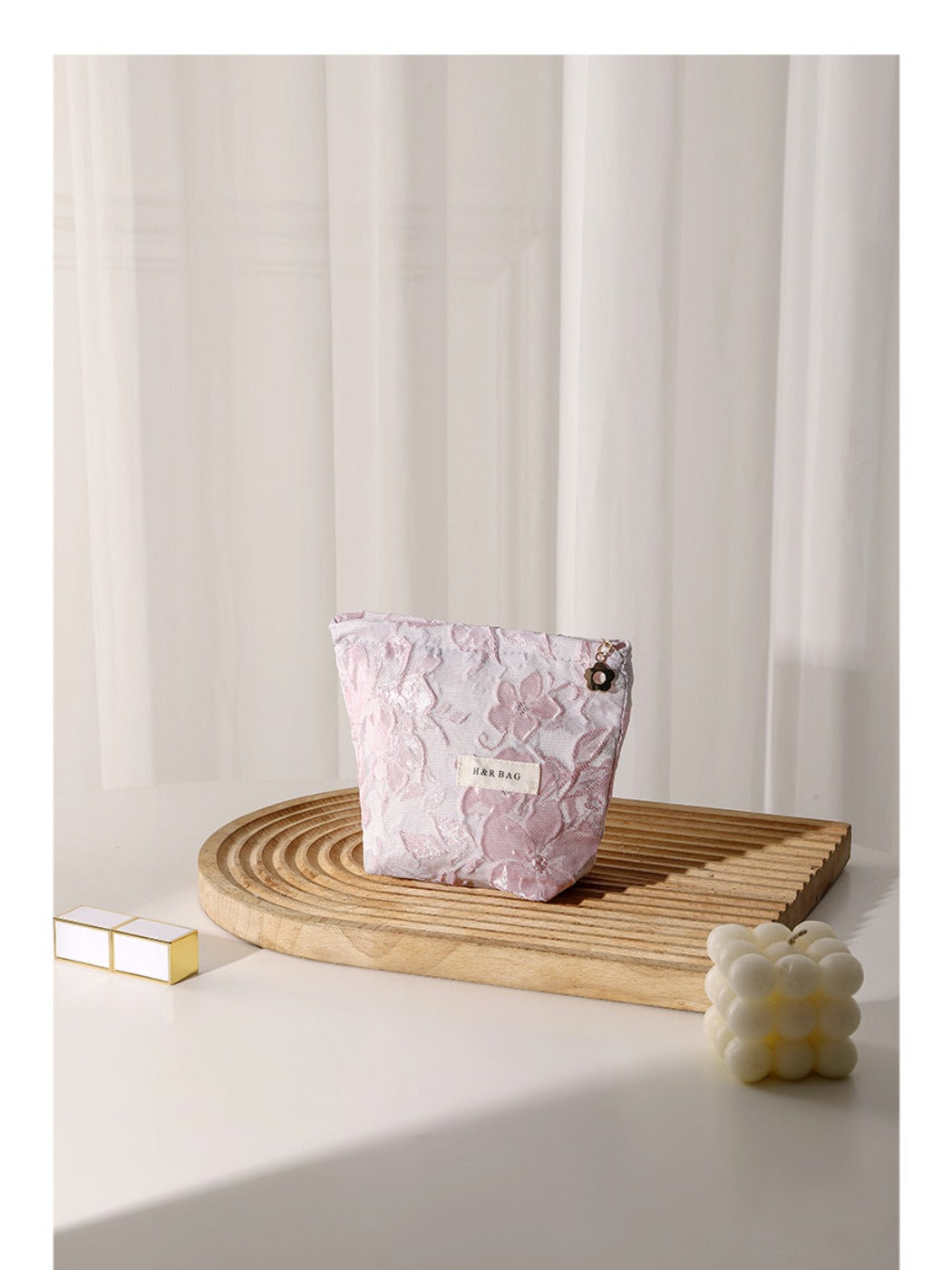 Cosbai floral cosmetic bag with pink and white flowers on a soft pastel background