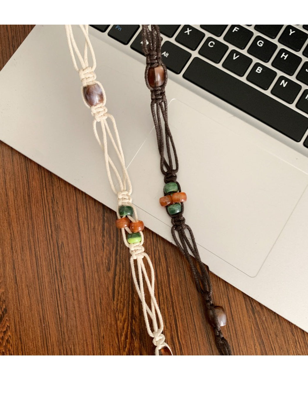 Close-up of belt ends showing beadwork and tie closure