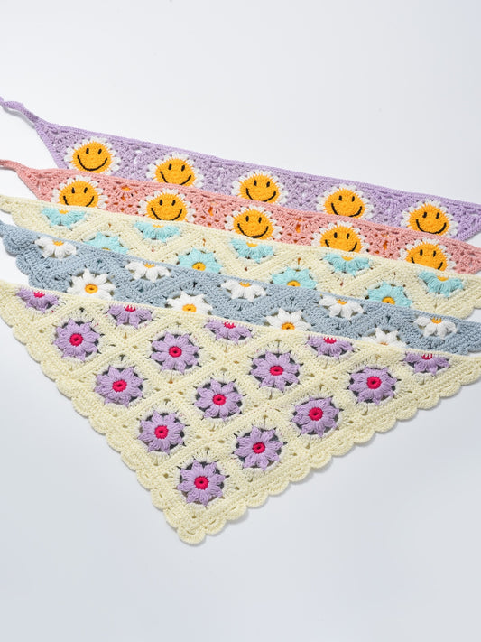 Scarvii crochet daisy smile hairband displayed on a white background