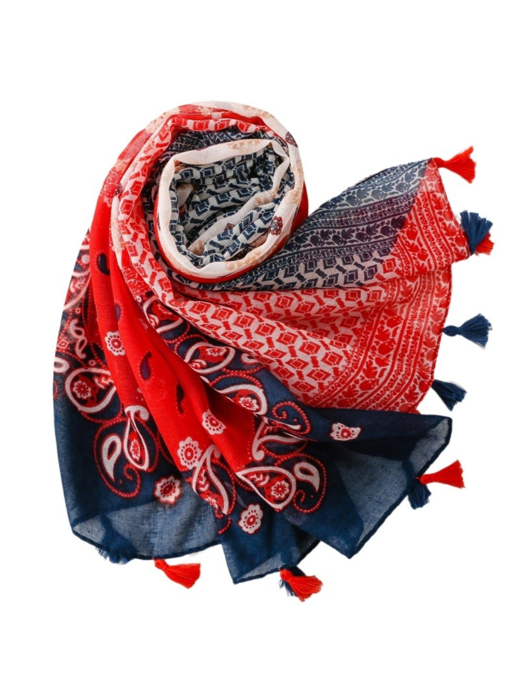 Model wearing red boho border wrap scarf styled around the neck outdoors