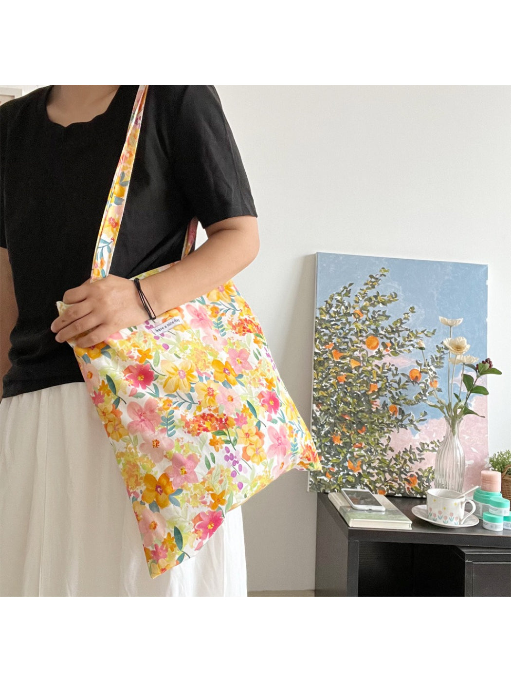 Side view of Cosbai Watercolour Bloom Carryall Tote highlighting bag depth and structure