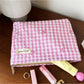 Close-up of Cosbai pastel check zip pouch showing fabric texture and zipper