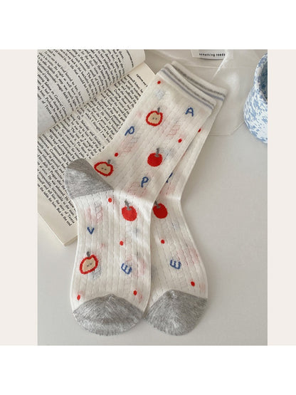 Side view of Rufia Playful Star Puppy crew socks highlighting pattern details