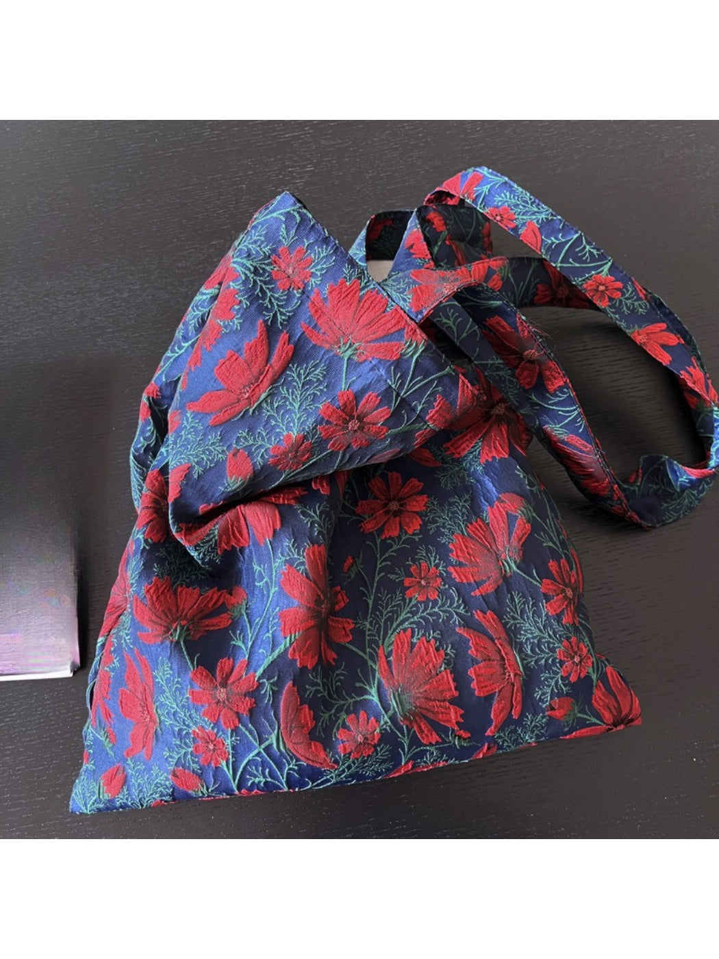 Model carrying Cosbai Vintage Bloom Everyday Tote Bag outdoors with casual outfit