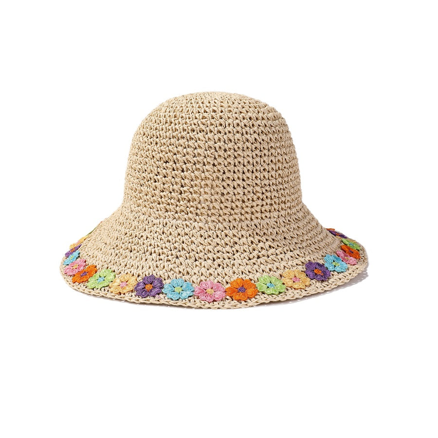 Model wearing Haila Rainbow Daisy Edge Sun Hat outdoors in sunlight