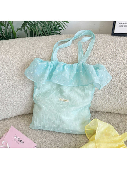 Close-up of ruffle detail and light dot pattern on Cosbai tote bag