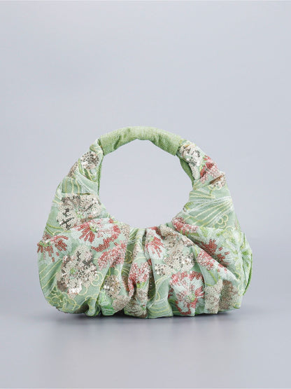 Cosbai Floral Sequin Ruched Hobo Bag resting on a white surface