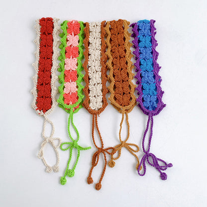 Side view of crochet flower hairband showing detailed flower patterns