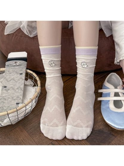 Rufia dog embroidered mesh low cut socks displayed flat with visible dog pattern