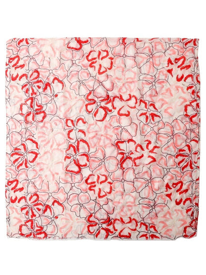 Close-up of Pink Petal Statement Scarf fabric highlighting pink and white petal design