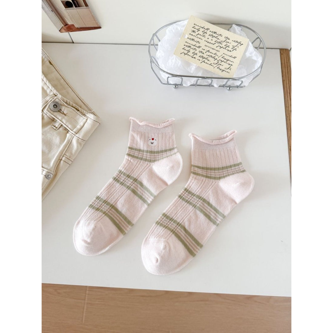 Rufia Cute Bear Stripe Crew Socks folded with visible bear face and stripes