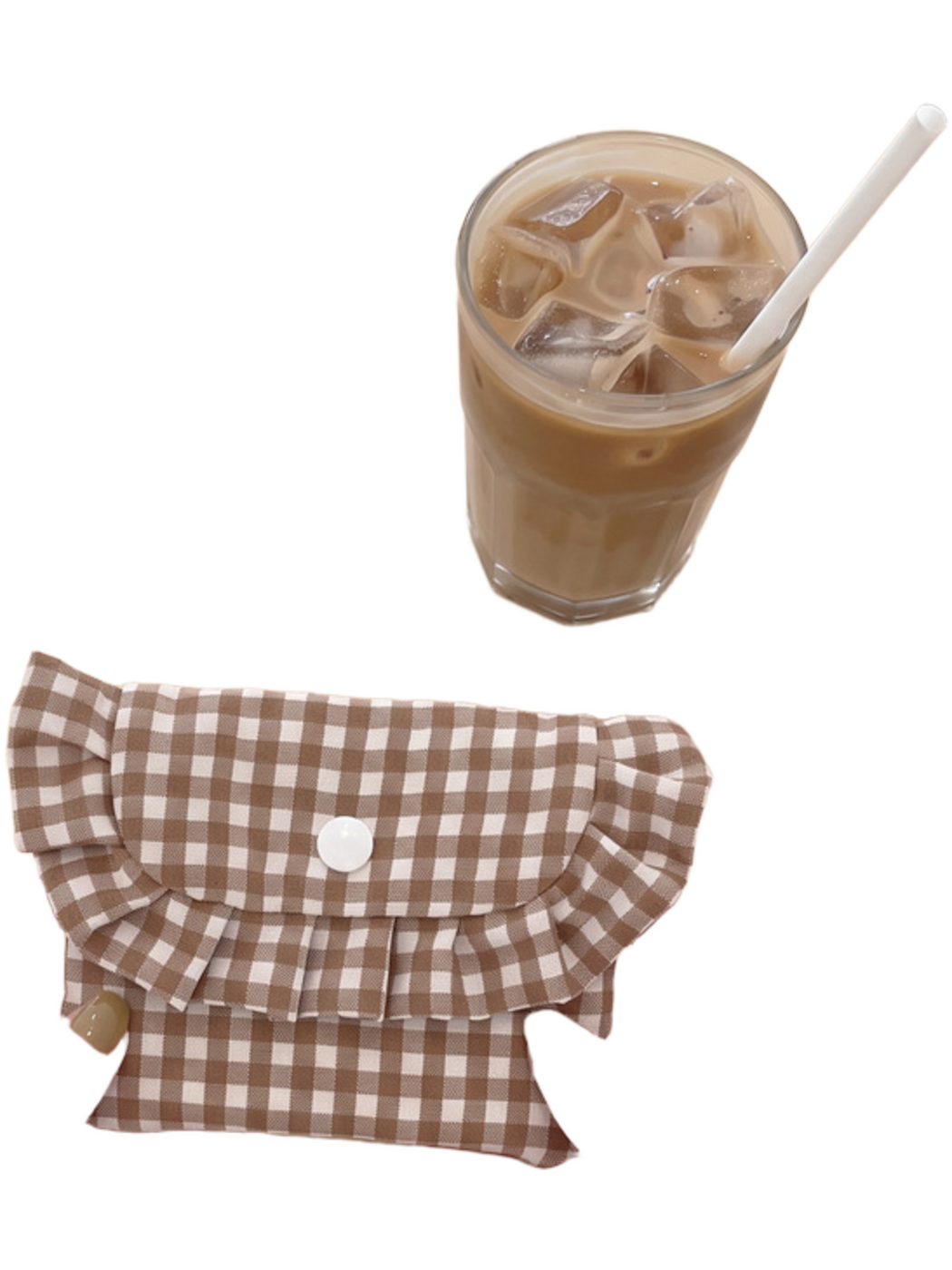 Brown gingham coin purse held above a round table, showing the ruffled flap and white snap