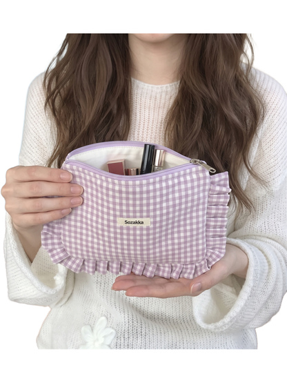 Light Purple gingham cosmetic pouch held open, showing the light interior and ruffled front