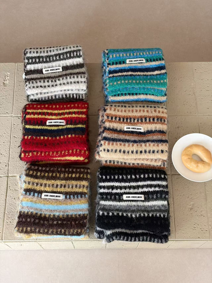 White, Blue, Burgundy, Khaki, Brown and Black striped scarves folded in two columns