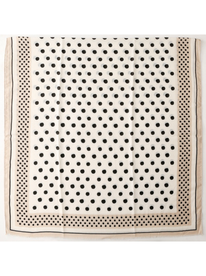 Scarf spread flat with large black dots and a smaller-dot border