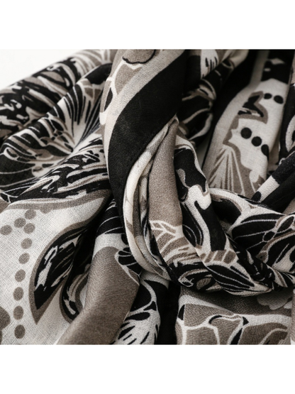 Close-up of the floral scarf gathered into deep folds