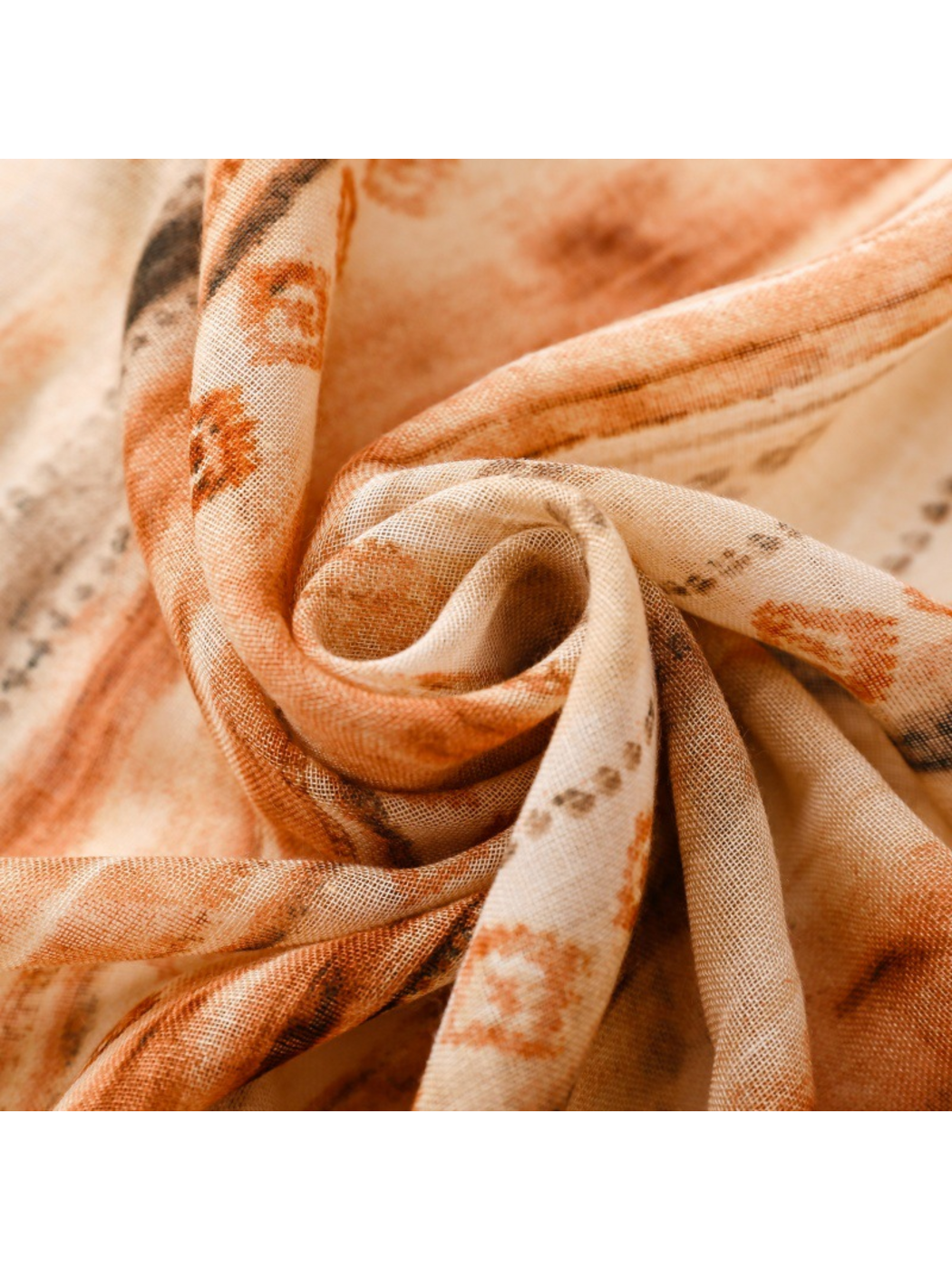 Close-up of striped scarf folds twisted into a spiral