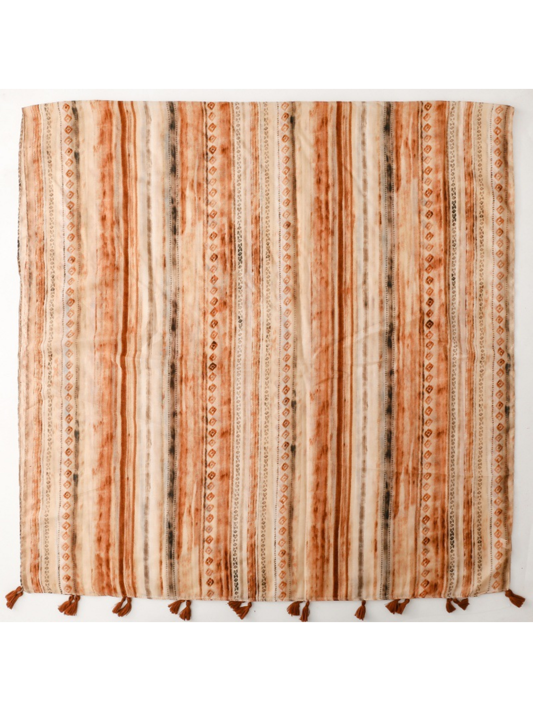 Scarf spread flat with lengthwise stripes, repeating diamond motifs and tasselled ends