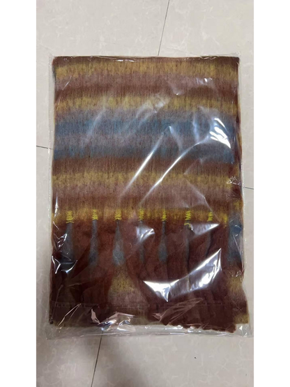 Caramel striped scarf folded inside clear plastic packaging
