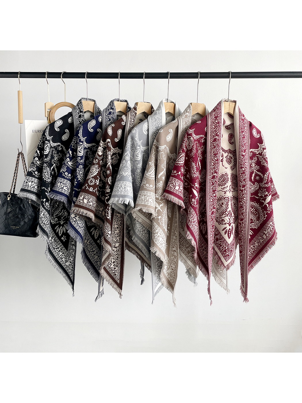 Black, Navy, Brown, Gray, Khaki and Red paisley scarves hanging together
