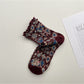 Pair of Rufia Heart White Mid-Calf Socks displayed side by side on white background