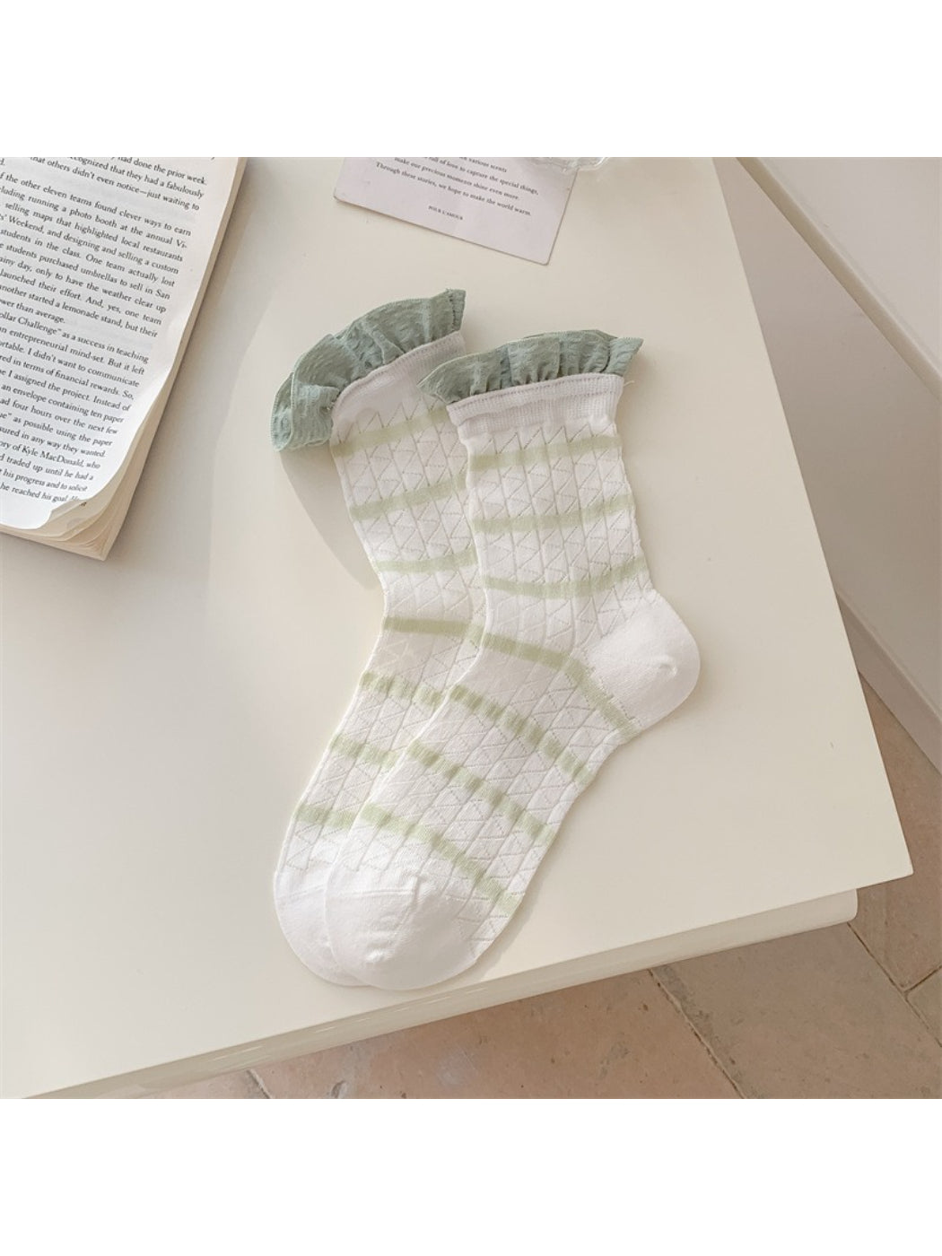 Close-up of frill cuff and stripe detail on Rufia summer crew sock in soft fabric