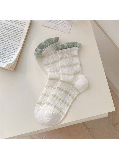 Close-up of frill cuff and stripe detail on Rufia summer crew sock in soft fabric