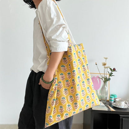Yellow floral everyday tote bag with soft fabric shoulder straps