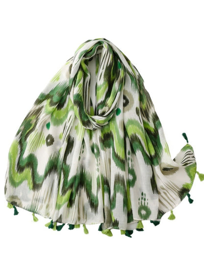 Scarvii Boho Ikat Tassel Wrap draped over a chair highlighting tassel edges