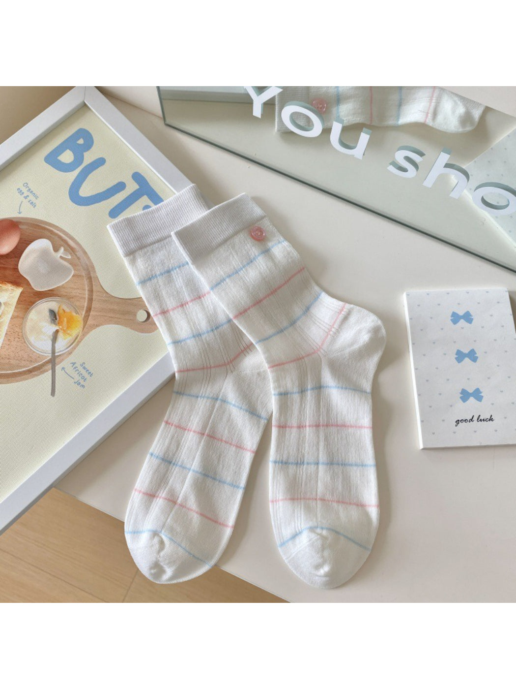 Packaging of Rufia Sweet Blue Ribbon crew socks with brand label visible