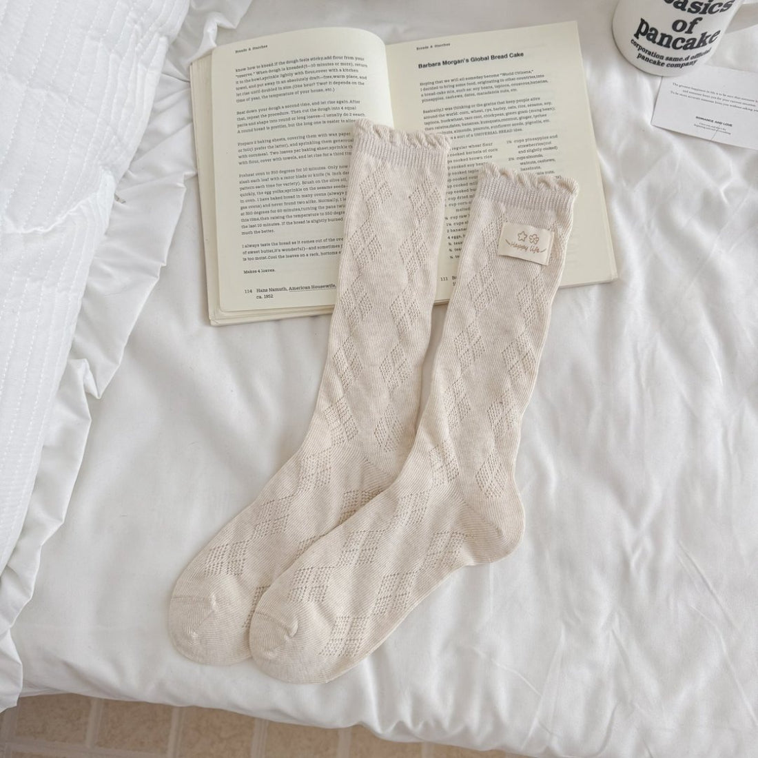 Rufia Fine Stripe Charm Crew Socks folded to show texture and stripe colors